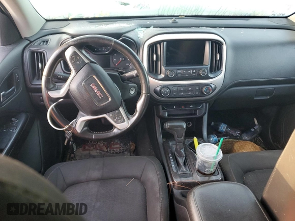 2015 GMC Canyon 2WD SLE with VIN 1GTH5BEA2F1131855, listed as a Copart auction lot 83924504 with 0 mi miles and Salvage Title. Bid and sale history available at carsss.com. Image 8.