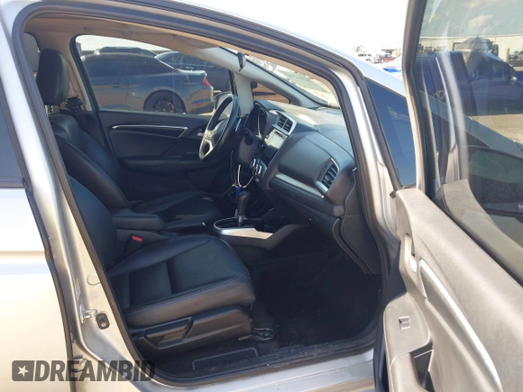 2016 Honda Fit EX-L with VIN 3HGGK5H90GM704300, listed as a IAAI auction lot 42462463 with 124,474 mi miles and . Bid and sale history available at DreamBid. Image 5.