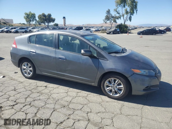 2011 Honda Insight EX z VIN JHMZE2H71BS006434, wystawiony jako Copart lot #58045495 z przebiegiem 270 645 mil mil oraz Czysty tytuł • Clean title. Historia ofert i sprzedaży dostępna na DreamBid. Obrazek 4.