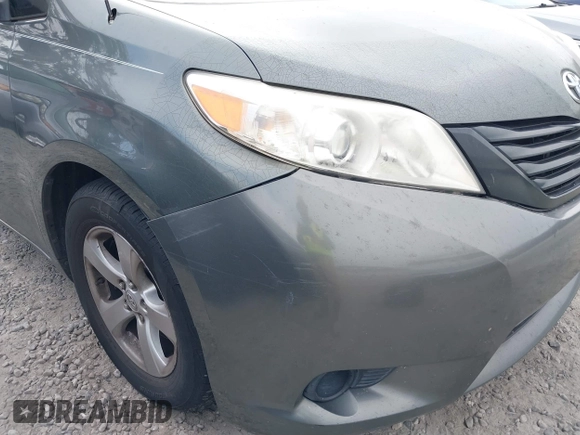 2014 Toyota Sienna L with VIN 5TDZK3DC6ES421278, listed as a IAAI auction lot 41178679 with 202,823 mi miles. Bid and sale history available at carsss.com. Image 20.