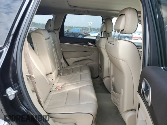 2015 Jeep Grand Cherokee Overland with VIN 1C4RJFCT6FC628729, listed as a Copart auction lot 44979155 with 105,959 mi miles and Salvage Title. Bid and sale history available at DreamBid. Image 11.