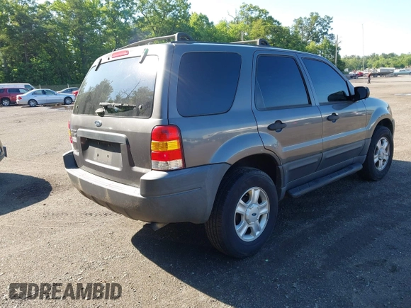 2004 Ford Escape XLT with VIN 1FMCU031X4DA18148, listed as a IAAI auction lot 42566498 with 264,092 mi miles and . Bid and sale history available at DreamBid. Image 4.