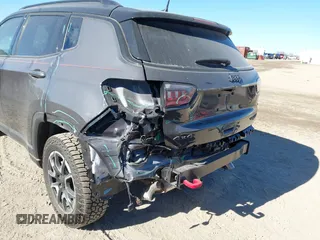 2024 Jeep Compass Trailhawk with VIN 3C4NJDDN4RT135384, listed as a IAAI auction lot 41251948 with 6,981 mi miles and . Bid and sale history available at DreamBid. Image 6.