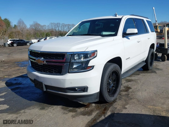 2019 Chevrolet Tahoe LT with VIN 1GNSKBKC7KR307869, listed as a IAAI auction lot 41833834 with 127,949 mi miles. Bid and sale history available at carsss.com. Image 17.