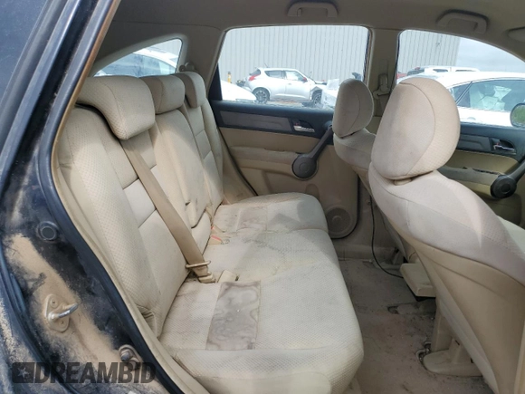 2009 Honda CR-V LX z VIN 5J6RE38309L015015, wystawiony jako Copart lot #56763035 z przebiegiem 211 946 mil mil oraz Szkoda całkowita • Salvage title. Historia ofert i sprzedaży dostępna na DreamBid. Obrazek 11.