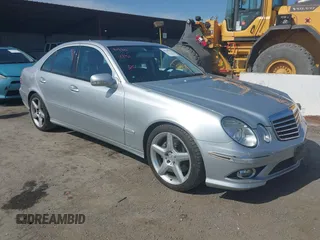 2009 Mercedes-Benz E Luxury 3.5L with VIN WDBUF56XX9B377940, listed as a IAAI auction lot 42158707 with 130,713 mi miles. Bid and sale history available at carsss.com. Image 1.
