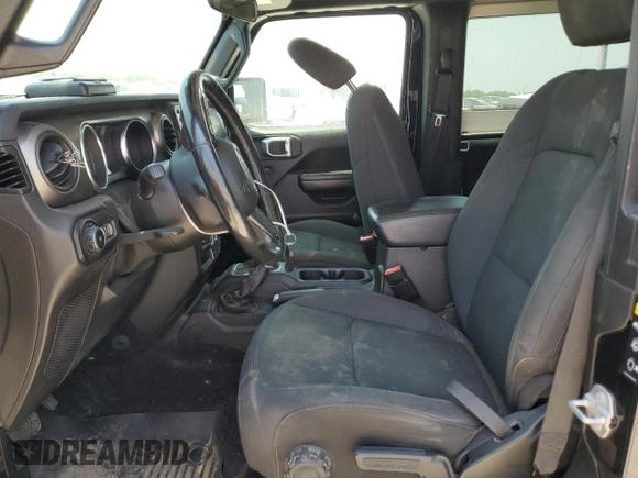 2020 Jeep Wrangler Sport with VIN 1C4GJXAGXLW237080, listed as a Copart auction lot 57769704 with 144,137 mi miles and Salvage title. Bid and sale history available at DreamBid. Image 7.