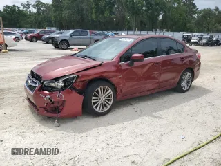 2016 Subaru Impreza Premium with VIN JF1GJAF68GH002464, listed as a Copart auction lot 60934235 with 105,012 mi miles and Salvage title. Bid and sale history available at DreamBid. Image 1.