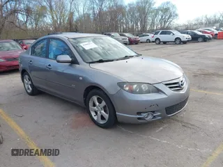 2005 Mazda 3 s with VIN JM1BK323551245843, listed as a IAAI auction lot 41860274 with 166,579 mi miles. Bid and sale history available at carsss.com. Image 1.