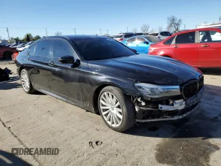 2016 BMW 7 Series 740i with VIN WBA7E2C54GG547404, listed as a Copart auction lot 40052803 with 94,008 mi miles. Bid and sale history available at carsss.com. Image 4.