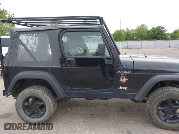 2000 Jeep Wrangler Sahara with VIN 1J4FA59S7YP805628, listed as a IAAI auction lot 42259201 with Not provided miles and . Bid and sale history available at DreamBid. Image 12.