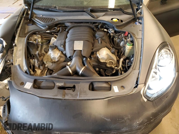 2015 Porsche Panamera 4 z VIN WP0AA2A73FL006102, wystawiony jako Copart lot #58297934 z przebiegiem 101 863 mil mil oraz Szkoda całkowita • Salvage title. Historia ofert i sprzedaży dostępna na DreamBid. Obrazek 11.