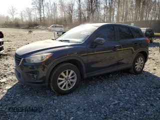 2016 Mazda CX-5 Touring z VIN JM3KE2CY2G0713586, wystawiony jako Copart lot #48479535 z przebiegiem 156 671 mil mil oraz Szkoda całkowita • Salvage title. Historia ofert i sprzedaży dostępna na DreamBid. Obrazek 1.