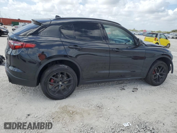 2019 Alfa Romeo Stelvio z VIN ZASPAKAN8K7C49262, wystawiony jako Copart lot #54317625 z przebiegiem Nie podano mil oraz Nie do naprawy • Non repairable. Historia ofert i sprzedaży dostępna na DreamBid. Obrazek 3.