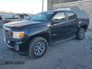 2021 GMC Canyon 4WD AT4 w/Cloth with VIN 1GTG6FEN5M1100096, listed as a Copart auction lot 77535584 with 25,152 mi miles and Salvage Title. Bid and sale history available at carsss.com. Image 1.