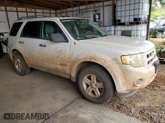 2010 Ford Escape Hybrid z VIN 1FMCU4K32AKA08232, wystawiony jako Copart lot #55356045 z przebiegiem 118 496 mil mil oraz Szkoda całkowita • Salvage title. Historia ofert i sprzedaży dostępna na DreamBid. Obrazek 4.