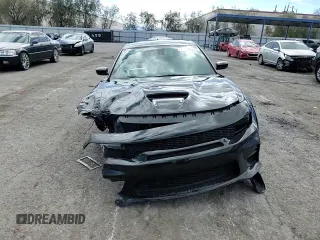 2020 Dodge Charger Scat Pack Widebody z VIN 2C3CDXGJ5LH232350, wystawiony jako Copart lot #47999665 z przebiegiem 37 599 mil mil oraz Szkoda całkowita • Salvage title. Historia ofert i sprzedaży dostępna na DreamBid. Obrazek 11.