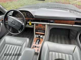 1988 Mercedes-Benz 560 with VIN WDBCA39D1JA406073, listed as a Copart auction lot 50398345 with 111,524 mi miles and Clean Title. Bid and sale history available at DreamBid. Image 9.