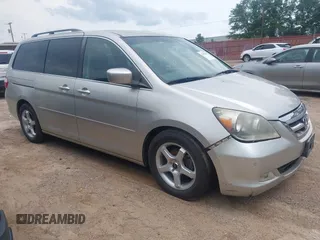 2006 Honda Odyssey Touring z VIN 5FNRL388X6B122708, wystawiony jako IAAI lot #42297056 z przebiegiem Nie podano mil oraz . Historia ofert i sprzedaży dostępna na DreamBid. Obrazek 1.