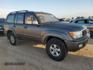 2000 Toyota Land Cruiser z VIN JT3HT05J9Y0123937, wystawiony jako Copart lot #56599145 z przebiegiem 132 262 mil mil oraz Szkoda całkowita • Salvage title. Historia ofert i sprzedaży dostępna na DreamBid. Obrazek 4.