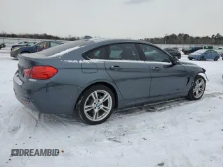 2016 BMW 4 Series 428i xDrive with VIN WBA4C9C59GG141121, listed as a Copart auction lot 45230225 with 103,576 mi miles and Salvage Title. Bid and sale history available at DreamBid. Image 3.