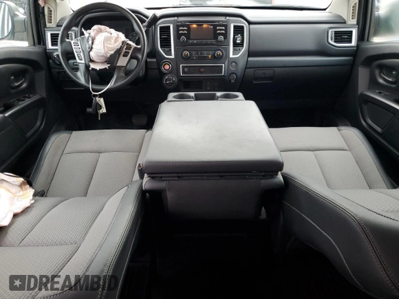 2017 Nissan Titan SV z VIN 1N6AA1EJ1HN559884, wystawiony jako Copart lot #55833245 z przebiegiem 125 222 mil mil oraz Szkoda całkowita • Salvage title. Historia ofert i sprzedaży dostępna na DreamBid. Obrazek 8.