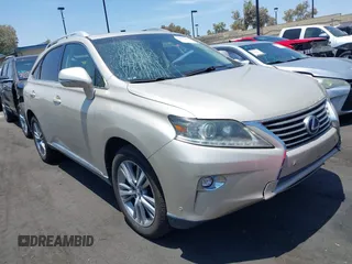 2015 Lexus RX 450h with VIN 2T2BC1BA0FC007066, listed as a IAAI auction lot 42462987 with 91,800 mi miles and . Bid and sale history available at DreamBid. Image 1.