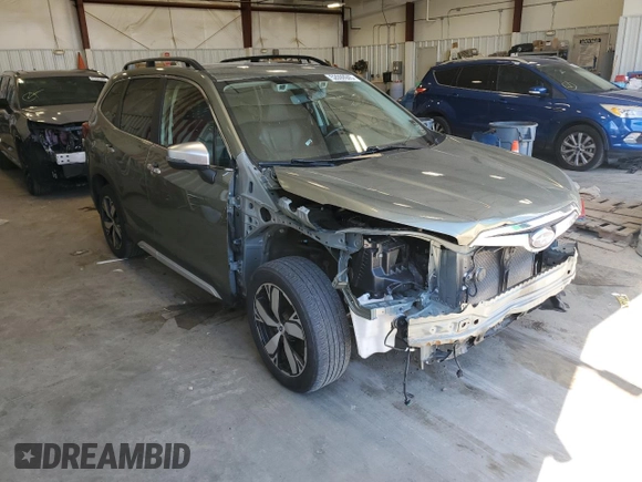 2019 Subaru Forester Touring with VIN JF2SKAWC0KH415724, listed as a Copart auction lot 52099945 with 95,622 mi miles and Salvage Title. Bid and sale history available at carsss.com. Image 4.