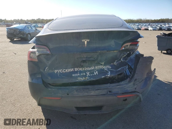2022 Tesla Model Y Performance with VIN 7SAYGDEF8NF375858, listed as a Copart auction lot 46127965 with Not Provided miles and Salvage Title. Bid and sale history available at DreamBid. Image 6.