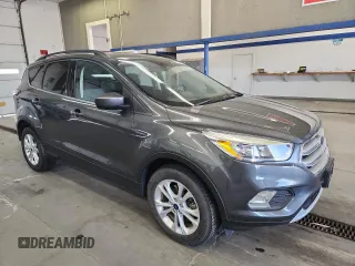 2018 Ford Escape SE z VIN 1FMCU9GD0JUC61682, wystawiony jako Copart lot #59105625 z przebiegiem 85 146 mil mil oraz Czysty tytuł • Clean title. Historia ofert i sprzedaży dostępna na DreamBid. Obrazek 4.