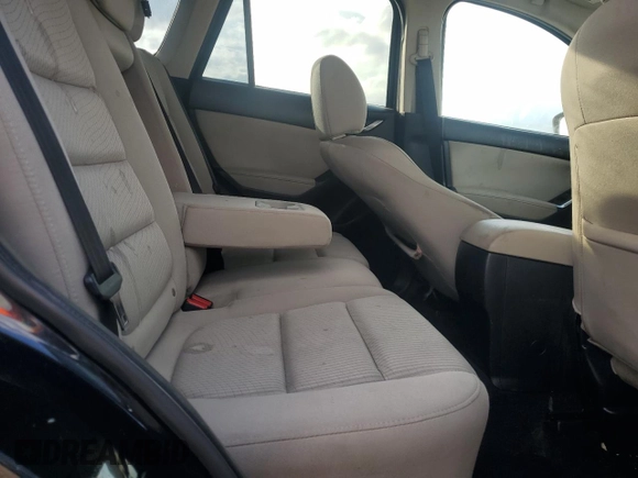 2014 Mazda CX-5 Touring with VIN JM3KE2CY9E0336218, listed as a Copart auction lot 49213255 with 124,749 mi miles and Salvage Title. Bid and sale history available at carsss.com. Image 11.