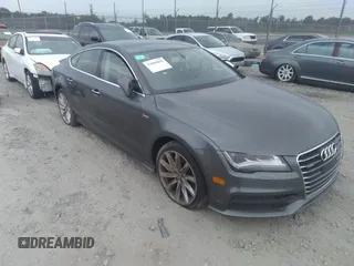 2012 Audi A7 z VIN WAU2GBFCXCN064228, wystawiony jako IAAI lot #33889055 z przebiegiem 123 175 mil mil oraz . Historia ofert i sprzedaży dostępna na DreamBid. Obrazek 1.