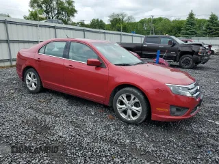2012 Ford Fusion SE with VIN 3FAHP0HA5CR234463, listed as a Copart auction lot 59362235 with 83,789 mi miles and Salvage title. Bid and sale history available at DreamBid. Image 4.