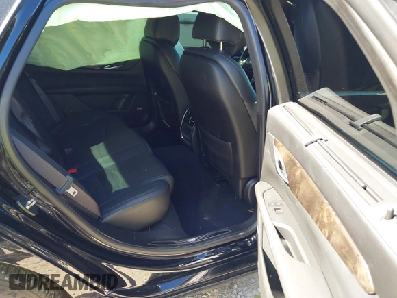 2016 Cadillac CT6 Luxury AWD with VIN 1G6KD5RS4GU166896, listed as a IAAI auction lot 41737650 with 58,118 mi miles and . Bid and sale history available at DreamBid. Image 8.