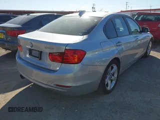 2012 BMW 3 Series 328i with VIN WBA3A5C5XCF345274, listed as a IAAI auction lot 41812072 with 142,024 mi miles. Bid and sale history available at carsss.com. Image 4.
