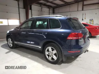 2012 Volkswagen Touareg Exec with VIN WVGEF9BP4CD011773, listed as a Copart auction lot 82461264 with 230,231 mi miles and Clean Title. Bid and sale history available at DreamBid. Image 2.