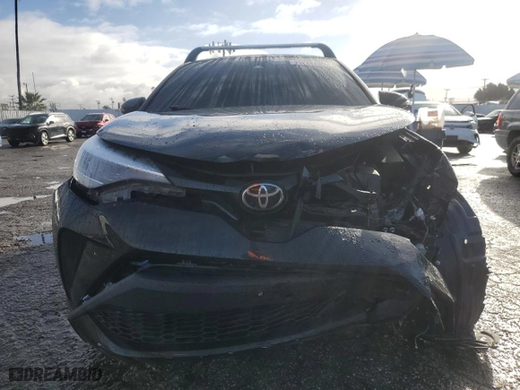 2021 Toyota C-HR LE with VIN JTNKHMBXXM1112416, listed as a Copart auction lot 45220435 with 53,335 mi miles and Salvage Title. Bid and sale history available at carsss.com. Image 5.