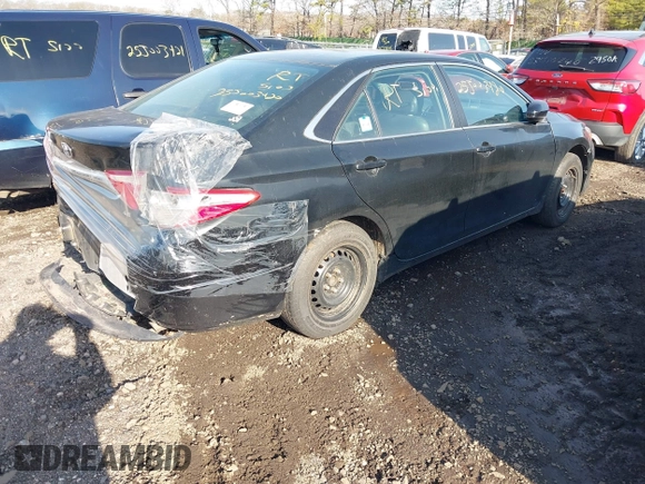 2016 Toyota Camry XLE with VIN 4T4BF1FKXGR549361, listed as a IAAI auction lot 41946584 with 221,775 mi miles and . Bid and sale history available at DreamBid. Image 4.
