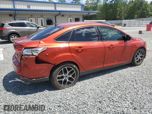 2018 Ford Focus SE with VIN 1FADP3FEXJL269131, listed as a Copart auction lot 55894765 with 33,752 mi miles and Salvage title. Bid and sale history available at DreamBid. Image 3.