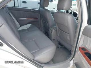 2006 Toyota Camry LE z VIN 4T1BF32K06U625986, wystawiony jako IAAI lot #42087979 z przebiegiem 202 550 mil mil oraz . Historia ofert i sprzedaży dostępna na DreamBid. Obrazek 8.