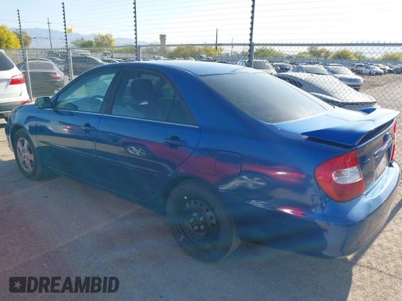 2003 Toyota Camry LE with VIN JTDBE32K930144631, listed as a IAAI auction lot 41994259 with 196,898 mi miles and . Bid and sale history available at DreamBid. Image 3.
