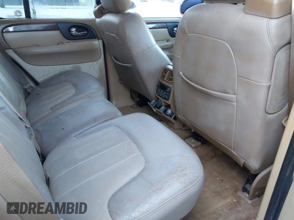 2003 GMC Envoy SLT with VIN 1GKDS13S132118361, listed as a IAAI auction lot 41909425 with 283,342 mi miles. Bid and sale history available at carsss.com. Image 8.