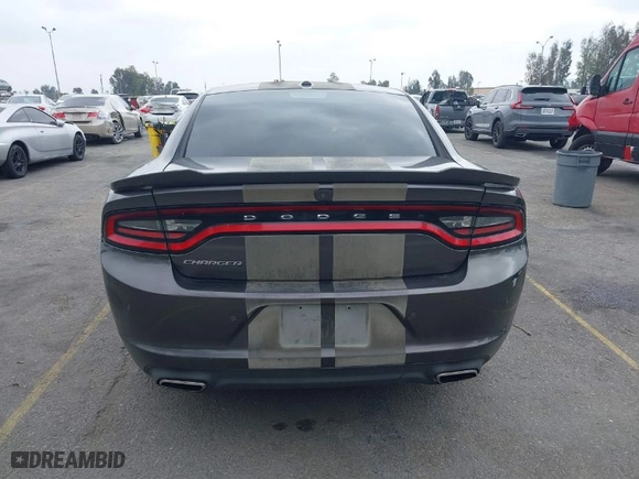 2019 Dodge Charger SXT with VIN 2C3CDXBG2KH643442, listed as a IAAI auction lot 41896681 with 104,061 mi miles. Bid and sale history available at carsss.com. Image 16.