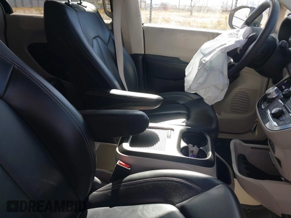 2023 Chrysler Pacifica Touring L with VIN 2C4RC1BG6PR531640, listed as a IAAI auction lot 42251680 with 31,638 mi miles and . Bid and sale history available at DreamBid. Image 5.