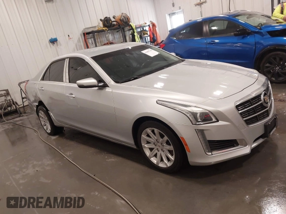 2014 Cadillac CTS Luxury AWD with VIN 1G6AX5SX3E0181029, listed as a IAAI auction lot 41895745 with 68,799 mi miles and . Bid and sale history available at DreamBid. Image 1.
