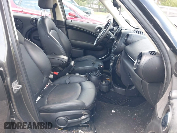 2014 MINI Countryman S with VIN WMWZC3C58EWP27041, listed as a IAAI auction lot 42082489 with 77,749 mi miles and . Bid and sale history available at DreamBid. Image 5.