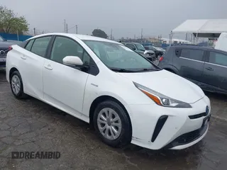 2021 Toyota Prius L Eco with VIN JTDKAMFU6M3141019, listed as a IAAI auction lot 41821212 with 202,756 mi miles. Bid and sale history available at carsss.com. Image 1.