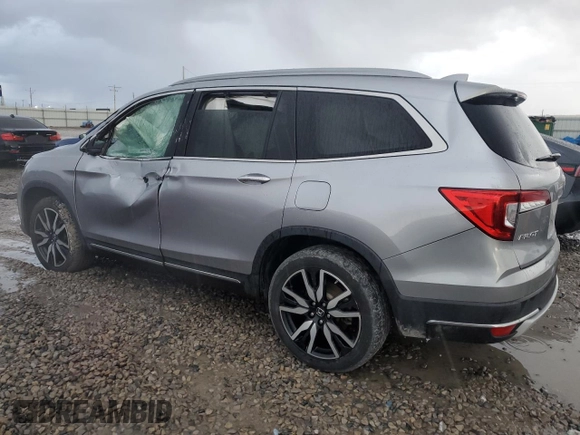 2020 Honda Pilot Touring 8-Passenger with VIN 5FNYF6H9XLB042625, listed as a Copart auction lot 86412804 with 52,061 mi miles and Salvage Title. Bid and sale history available at DreamBid. Image 2.