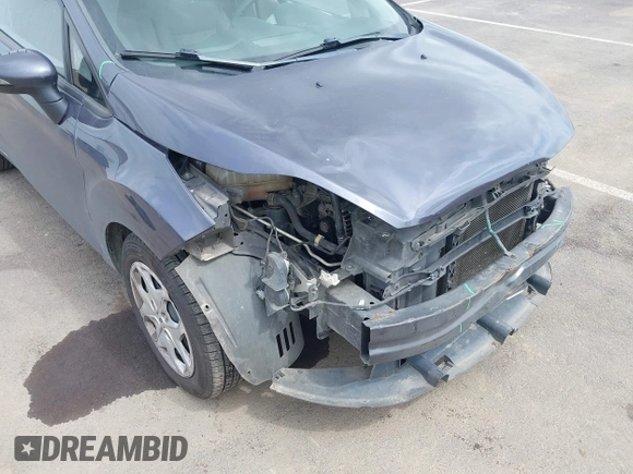 2013 Ford Fiesta SE z VIN 3FADP4BJ3DM186569, wystawiony jako IAAI lot #42128913 z przebiegiem 19 228 mil mil oraz . Historia ofert i sprzedaży dostępna na DreamBid. Obrazek 13.