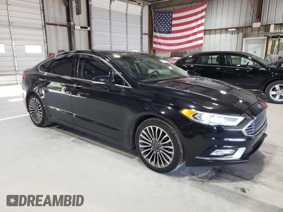 2018 Ford Fusion Titanium с VIN 3FA6P0D9XJR241506, выставлен на аукционе Copart как лот 60736525 с пробегом 109 548 миль миль и Списание • Salvage title. История ставок и продаж доступна на DreamBid. Изображение 4.